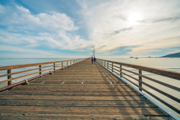 Beautiful point of view shot down Avila Beach pier, California.