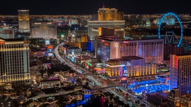 Stunning aerial image, Las Vegas Strip glowing against night sky, Las Vegas, Nevada. 