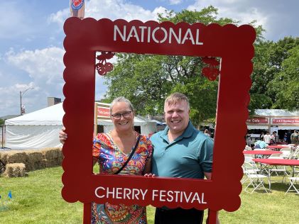 Two Hilton Grand Vacations Members at the National Cherry Festival in Michigan