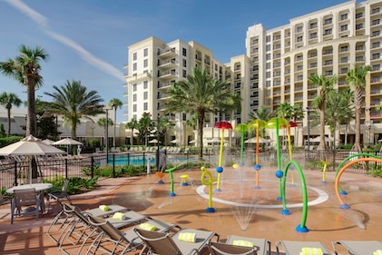 The splash pad pool area on a sunny day at Las Palmeras, a Hilton Grand Vacations Club, Orlando, Florida