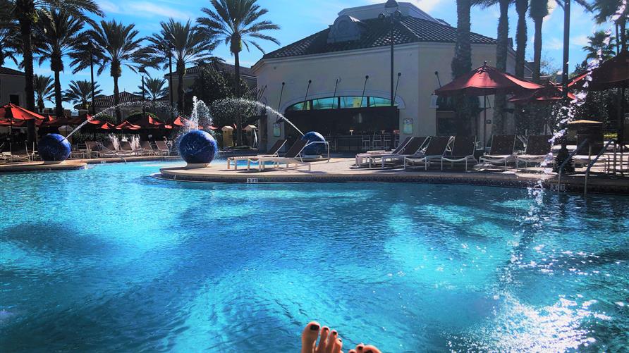A shot of a Hilton Grand Vacations pool from the perspective of a Hilton Grand Vacations timeshare Owner.