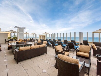 10th floor of Oceanaire Resort with stylish furniture and design overlooking Virginia Beach, Virginia.